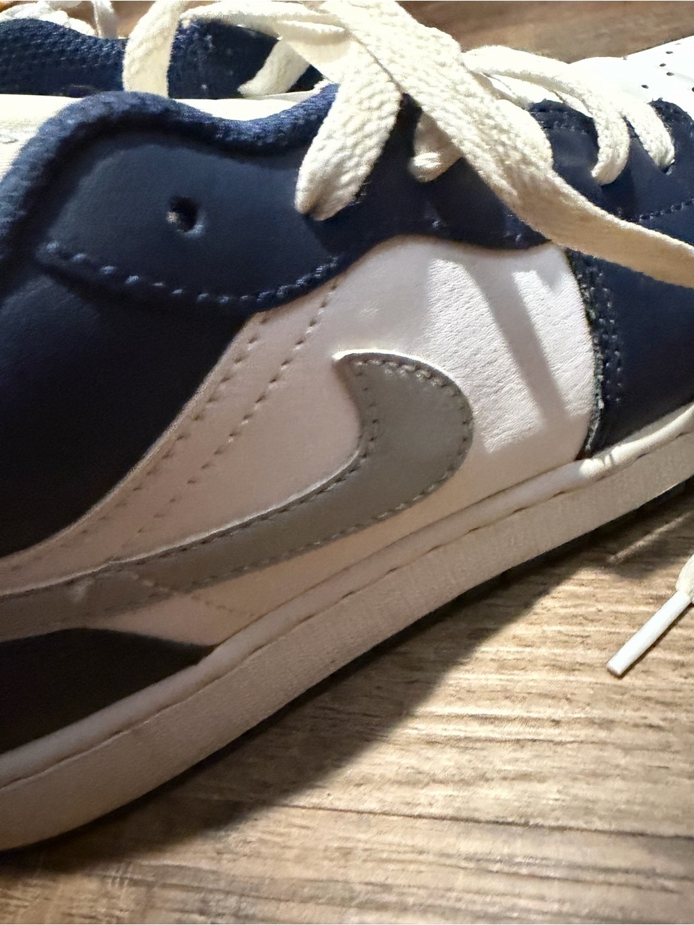 Kids White and Navy Athletic Jordan sneakers